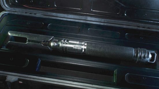 Jedi survivor lightsaber stances: Cal Kestis' lightsaber sits in a black case.