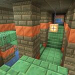 the copper and stone interior of a Minecraft Trial Chamber that can be found in one of the best 1.21 Minecraft seeds.