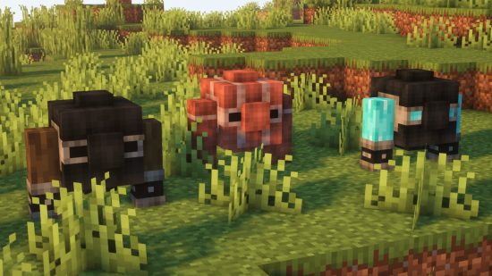 Three cobblestone golems from Max's Miny Golems, one of the best Minecraft mods, stand in the sunlight.